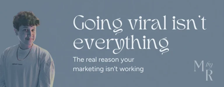 Marketing by Rocio founder posing right next to words "Going viral isn't everything"